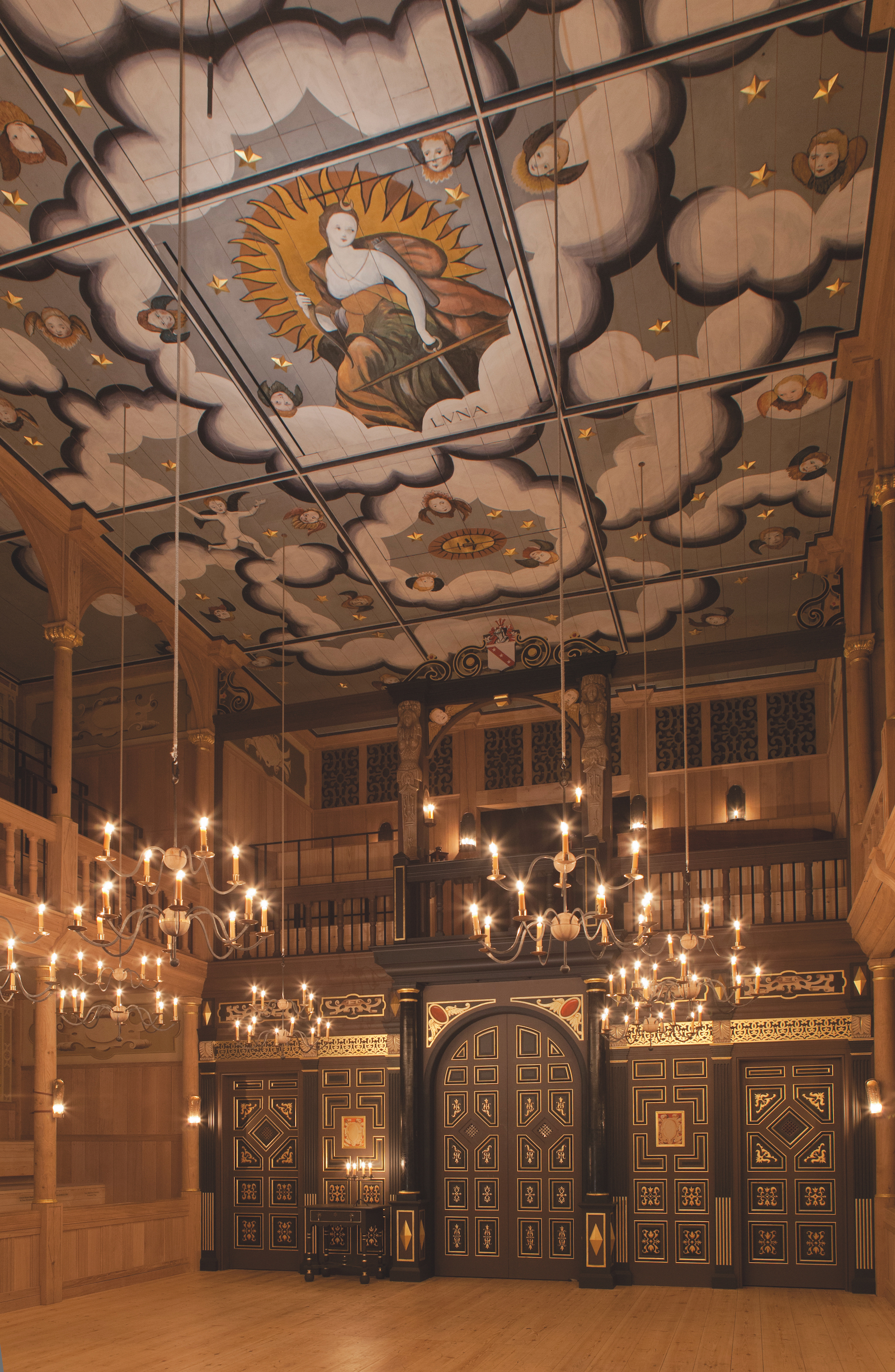 Sam Wanamaker Playhouse Pete Le May A tall ceilinged theatre with candelabras