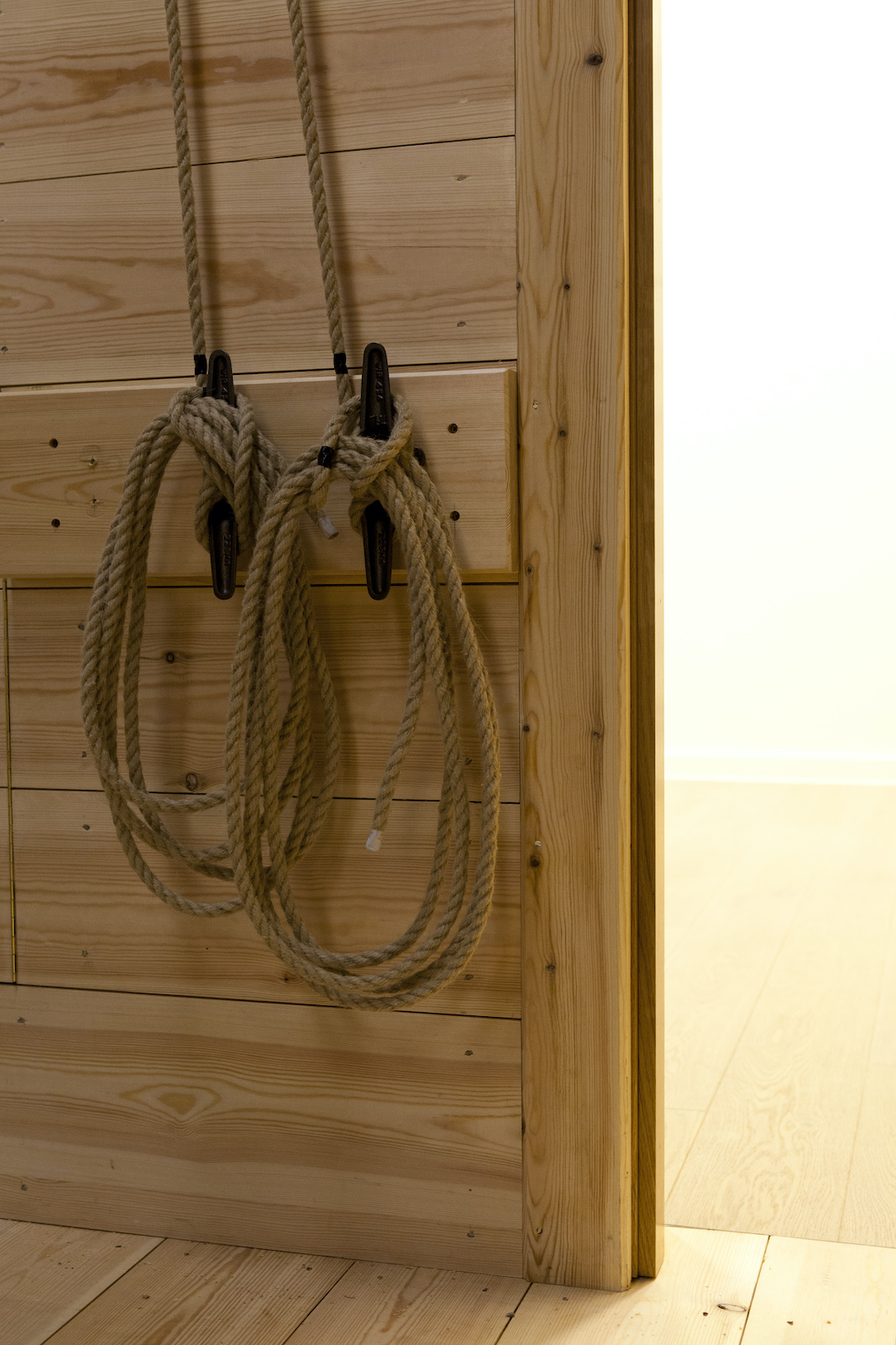 Sam Wanamaker Playhouse Pete Le May Ropes are tied to handles against a wooden wall