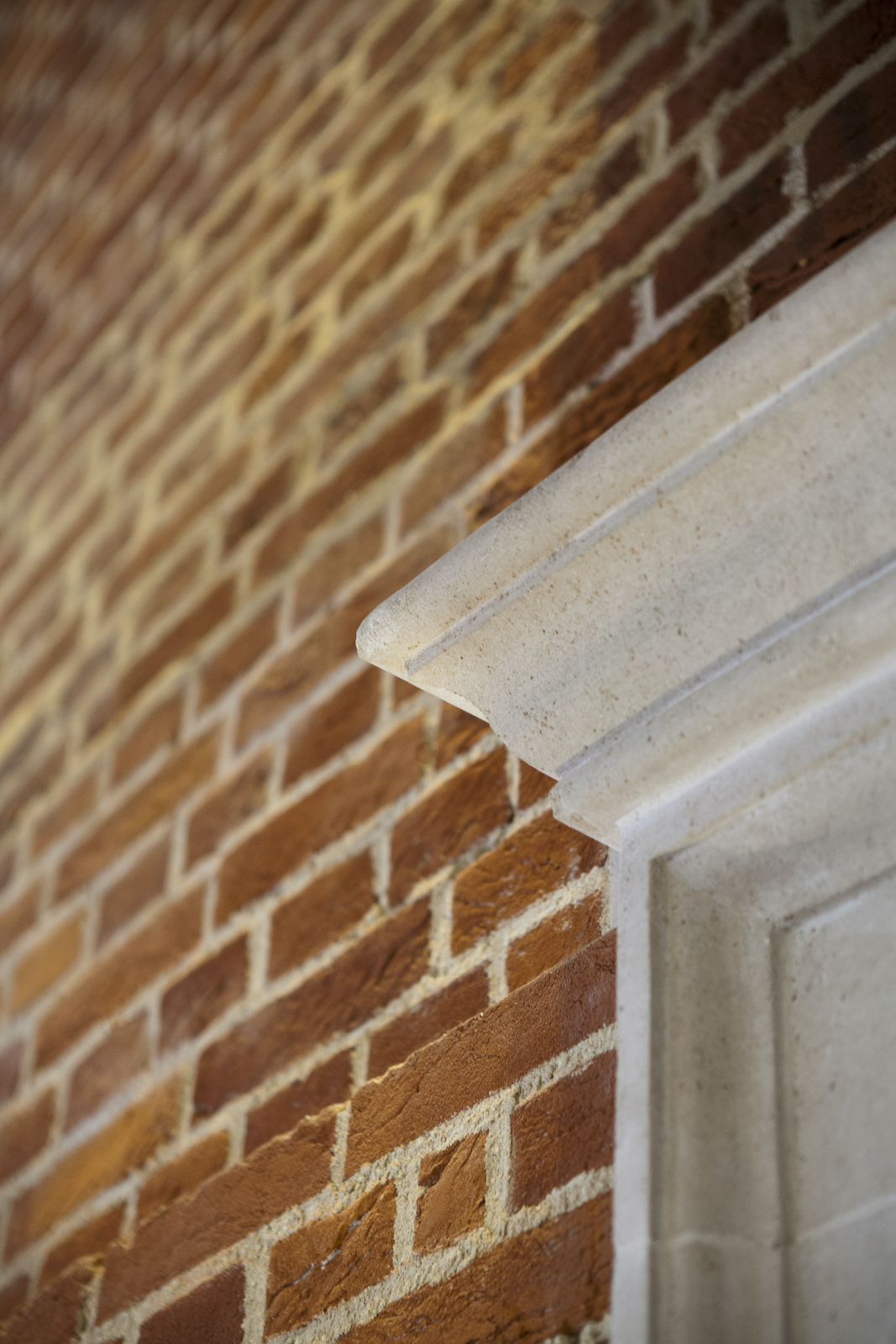 Sam Wanamaker Playhouse Pete Le May Details of a white door frame against a brick building