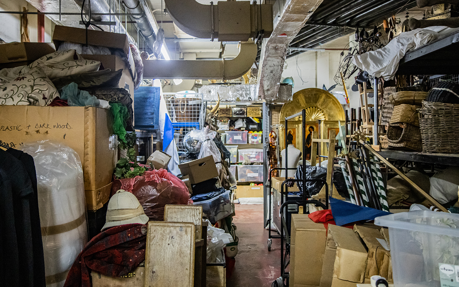 Heaven to Hell Globe Magazine Article Greg Morrison Costume Storage A basement heaving with stage props and costumes