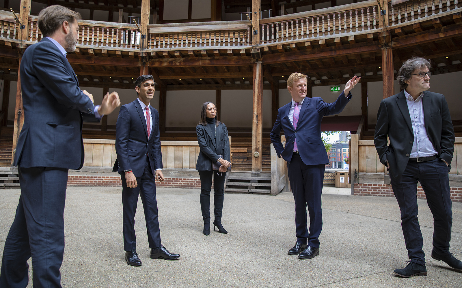 Globe Magazine Online Culture Recovery Fund Neil Constable Rishi Sunak Margaret Casely-Hayford Oliver Dowden Patrick Spottiswoode A group of people stand in the middle of an open air theatre