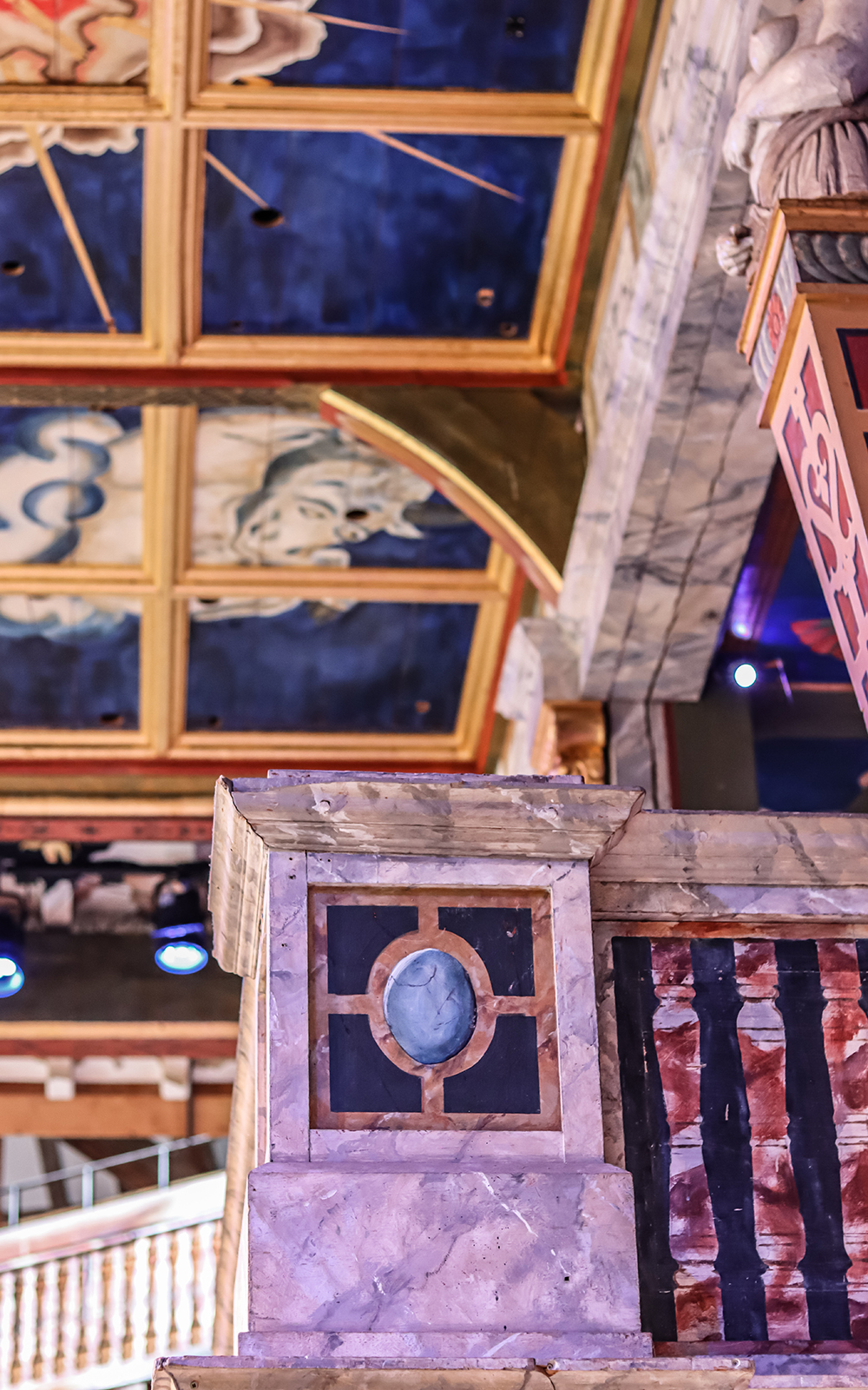 Heaven to Hell Globe Magazine Article Greg Morrison Stage Mock marble and bright coloured details of the stage roof