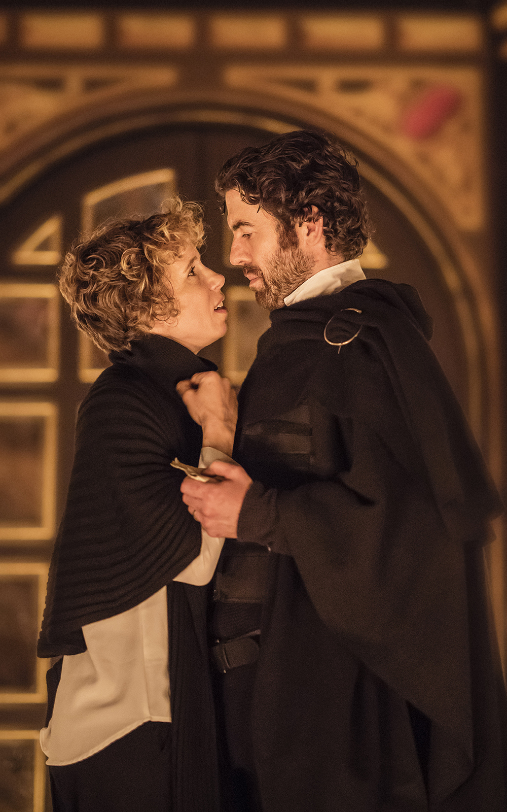 Globe Magazine Article Macbeth 2018 Michelle Terry Paul Ready A man holds a woman closely, looking intense