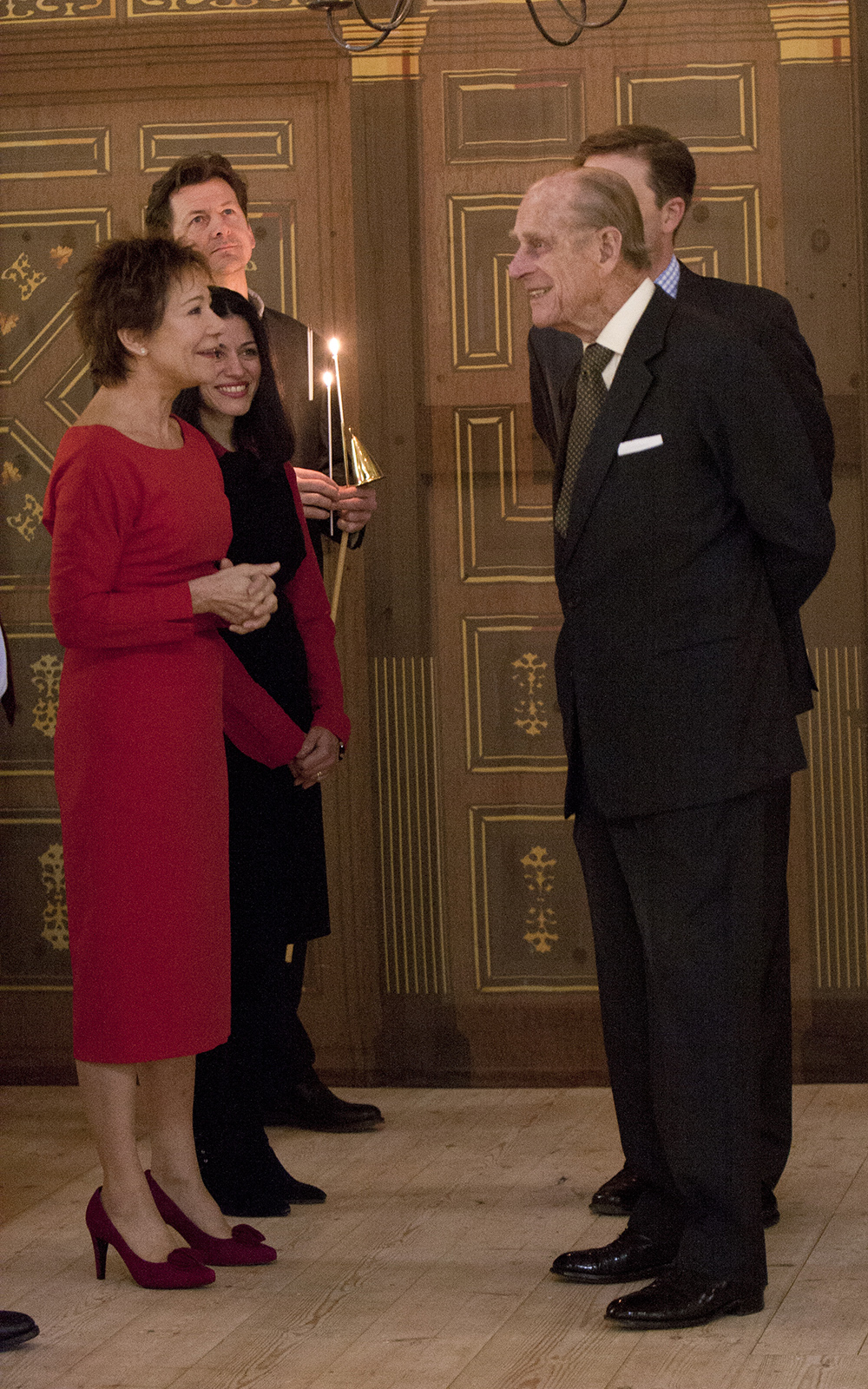 Zoe Wanamaker and His Royal Highness The Prince Philip, Duke of Edinburgh stand talking to each other in the Sam Wanamaker Playhouse.
